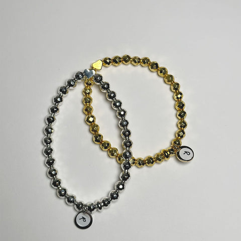 Gold and silver stacked hematite Stone Bracelet with a heart charm