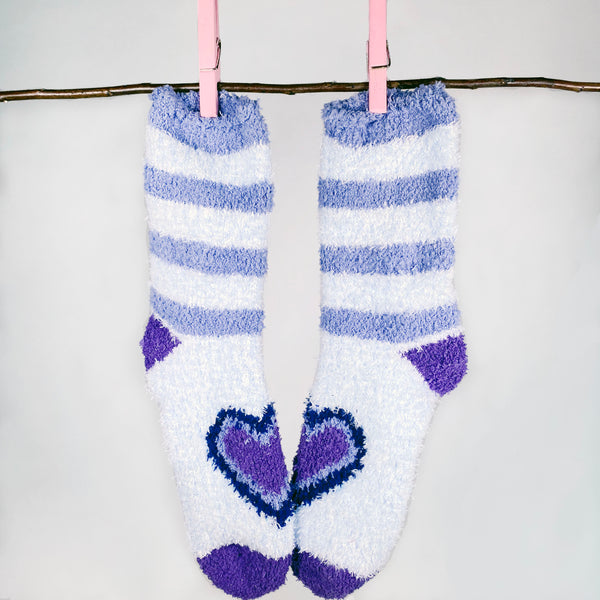 purple soft and fuzzy socks with hearts and stripes
